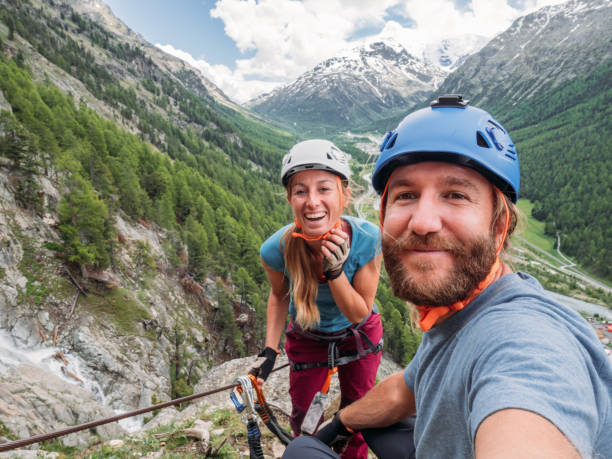 istock Couple taking selfie on Via Ferrata 1284589859