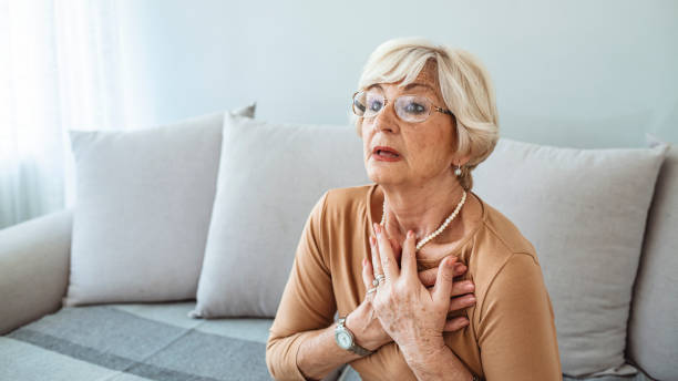 istock Good looking aged woman having heart attack. 1284591371