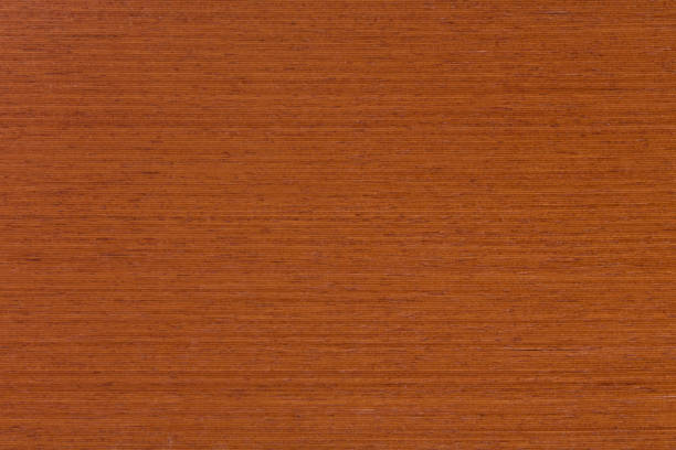 istock Veneer from natural mahogany red wood on macro. 1284592249