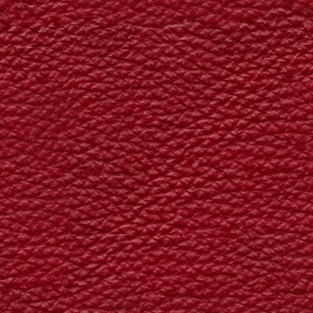 istock Elegant red leather background for ideal interior. 1284593605