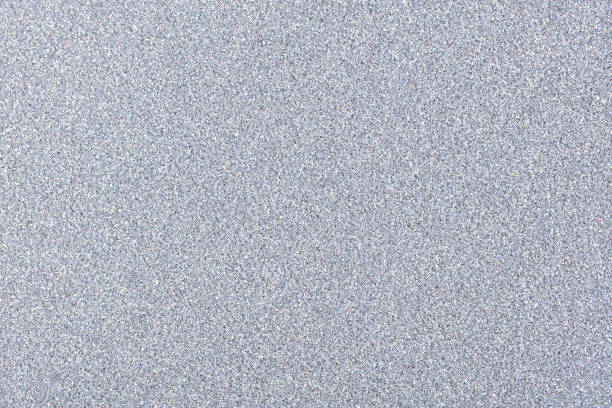 istock Glitter background in light grey color, new holiday texture for your mood. 1284594212