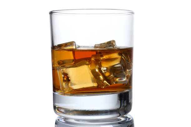 istock Classic glass of single malt scotch with ice 1284594287