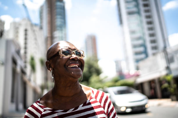 istock Happy senior woman outdoors looking away 1284594670