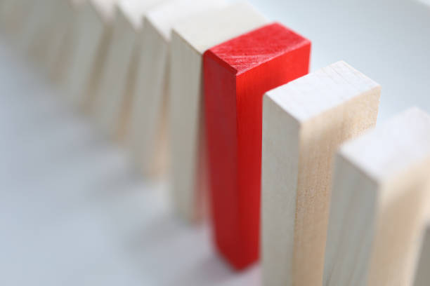 istock Board game of white and red wooden blocks 1284597054