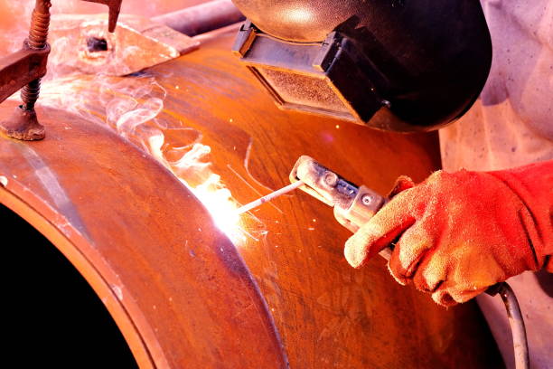 istock technician welding steel heavy pipes 1284601422