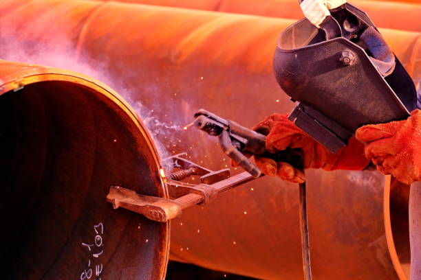istock technician welding steel heavy pipes 1284601423