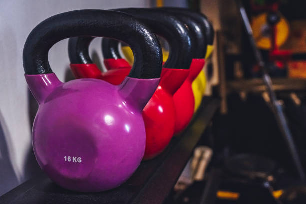 istock different color iron kettlebells in gym workout 1284602725