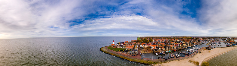 Urk village with the beautiful colorful lighthouse at the harbour by the lake ijsselmeer Netherlands Flevoalnd Europe