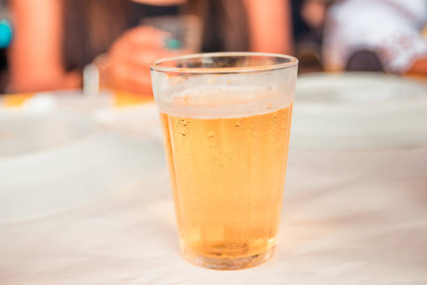 istock glass of light beer on typical brazilian cup (americano long drink) 1284608491
