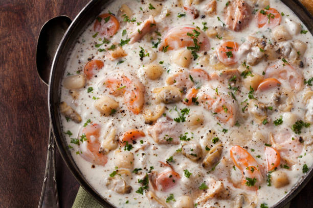 istock Seafood Chowder with Shrimp, Bay Scallops, Clams and Salmon 1284610382