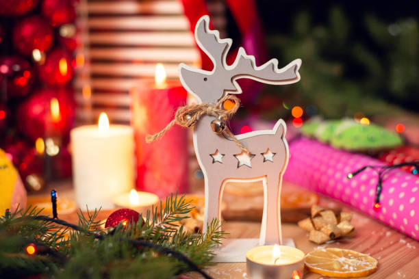 istock Cute wooden deer in festive surrounding. 1284611757
