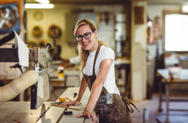 istock Portrait of a Female Carpenter at Work 1284614626