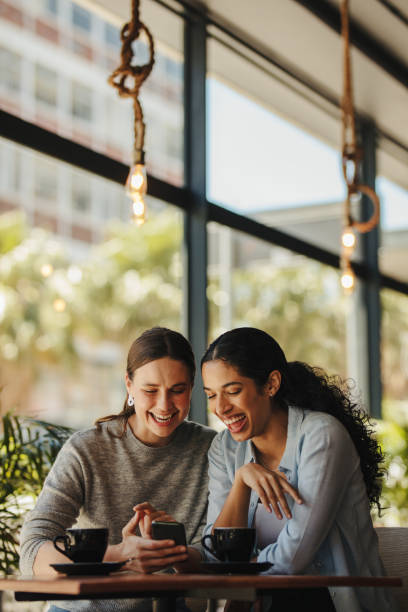 istock Friends sitting in a cafe 1284615522