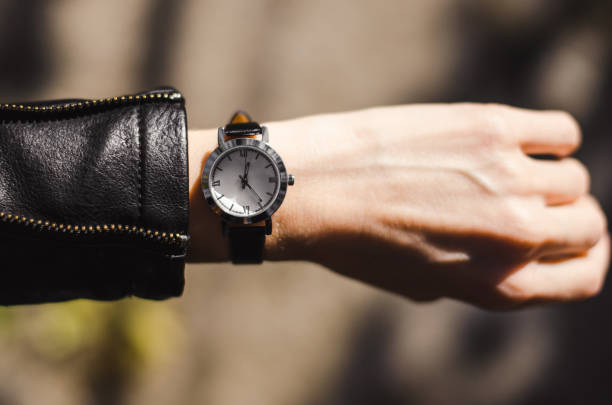 istock Fashionable watch on a woman's hand 1284616653