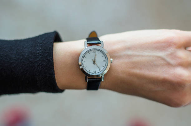 istock Fashionable watch on a woman's hand 1284616655