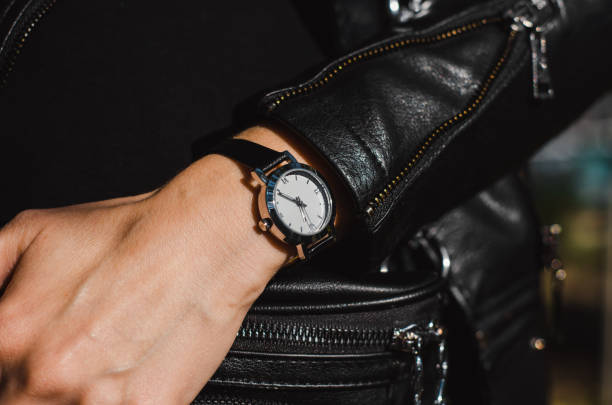 istock Fashionable watch on a woman's hand 1284616669