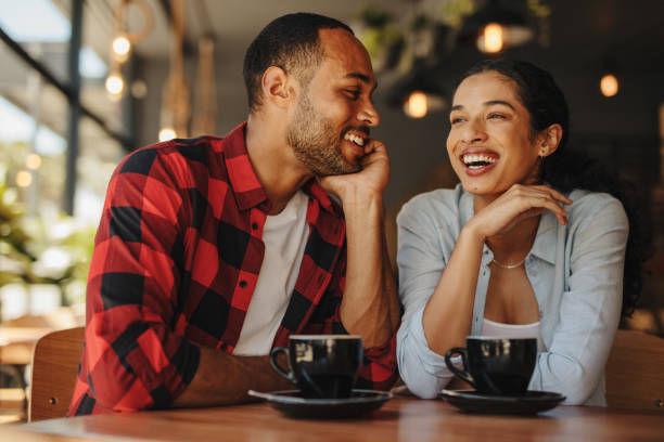 istock Beautiful couple at cafe 1284616714