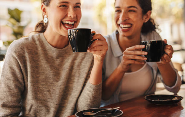 istock Best friends gossing over coffee 1284616760