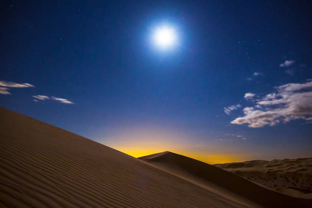 istock Sand Dune Mountain Moon Rise Night Sky 1284617951