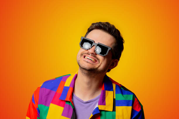 istock style guy in 90s shirt and pixel sunglasses on yellow background 1284619128