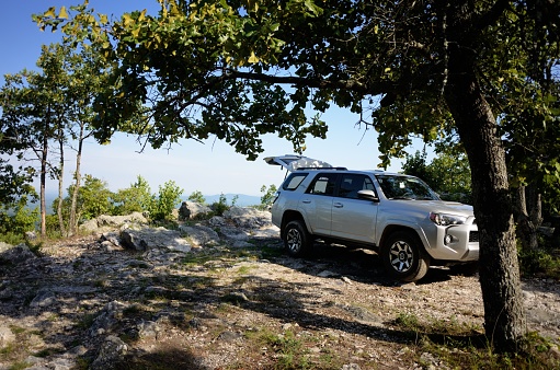 Talladega, Alabama - June 15, 2019: Overlanding campsite with Toyota 4Runner at scenic overlook located along Forest Service Road 600 in the Talladega National Forest near Talladega, Alabama.