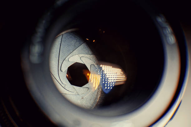Front lens of the lens with reflection and aperture. Old manual lens.