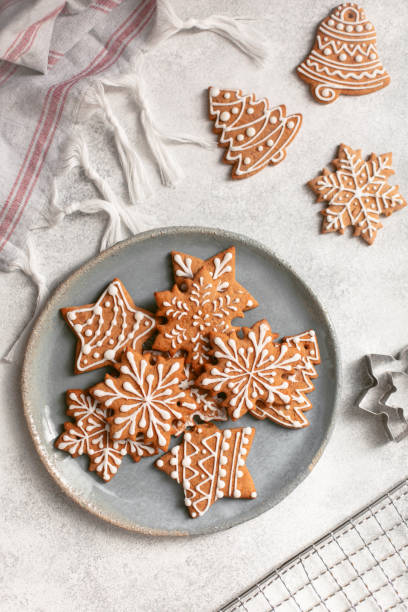 istock Gingerbread cookies on plate on concrete background 1284622402