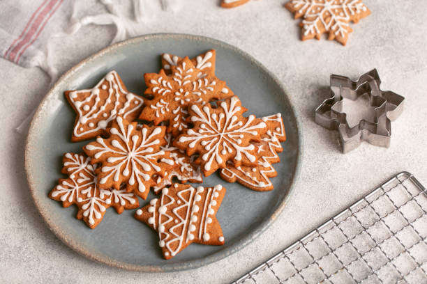 istock Gingerbread cookies on plate on concrete background 1284622406
