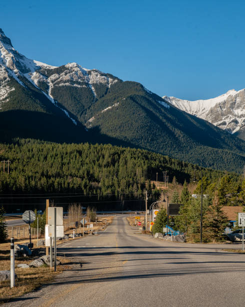istock Single Lane Highway Going through the Rocky Mountains 1284623205