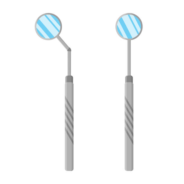 istock Vector cartoon illustration of dental examination mirrors isolated on white background. 1284625502