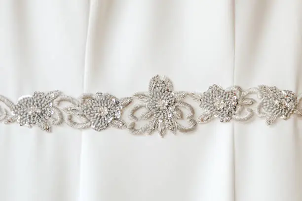 Details of the fabric of a wedding dress