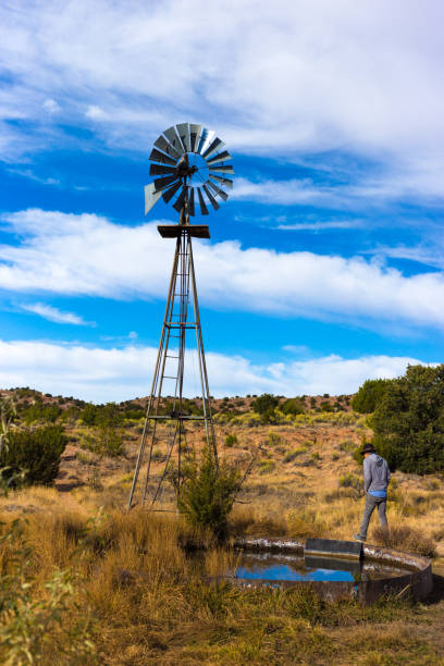 istock Rancher at Southwest USA Desert Ranch Windmill 1284627041