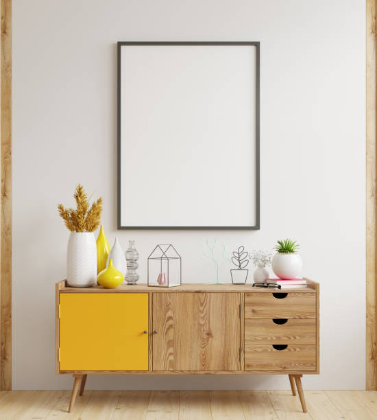 istock Mock up poster frame on cabinet in interior 1284632935