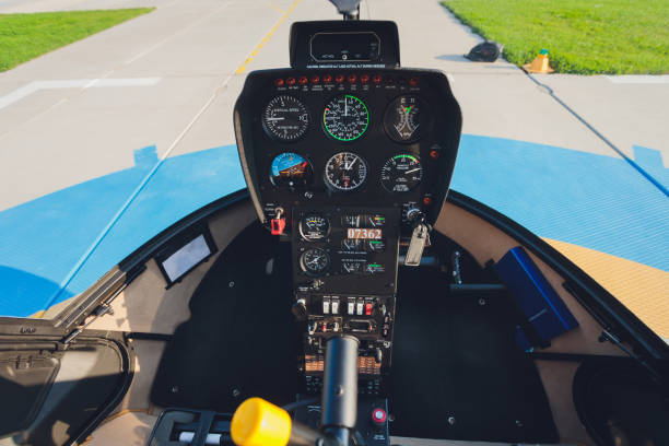 istock Helicopter dashboard close up. Helicopter Robinson r44 inside the cockpit view. 1284636350
