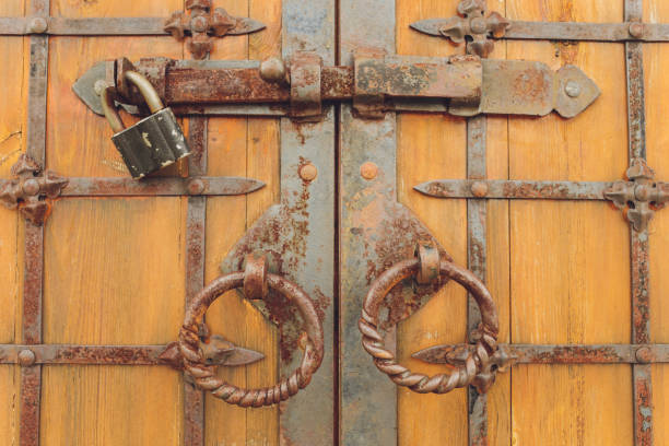 istock an old wood door with metal handle. 1284636384