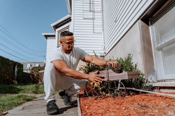 istock Man working outside the house 1284648585