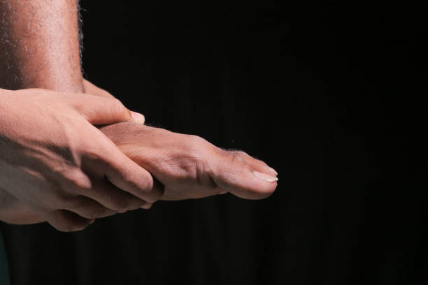 istock Close up on young man suffering feet pain 1284656162