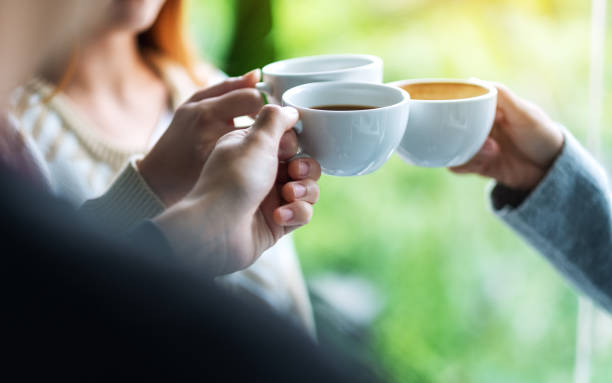 istock A group of young people enjoyed drinking and clinking coffee cups together 1284656266