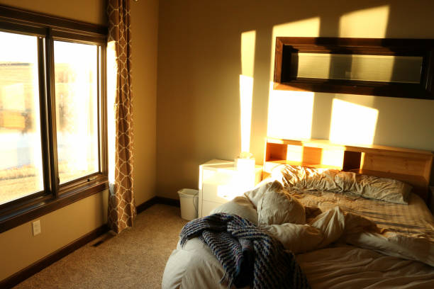 istock Warm Sunshine in Master Bedroom 1284657958