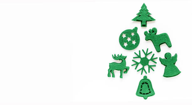 istock Creative christmas tree layout made from felt decorations. Flat lay, copy space. Holiday festive minimal concept 1284659241