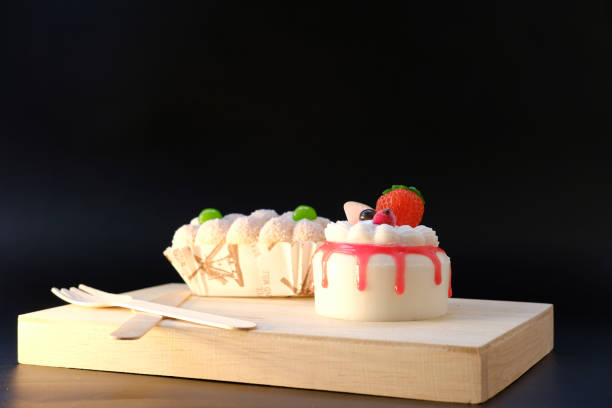 istock sweet cake on wood table background and space for text 1284659264