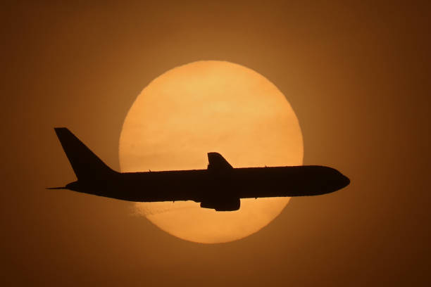 istock A cargo plane on its final approach into Airport 1284659279