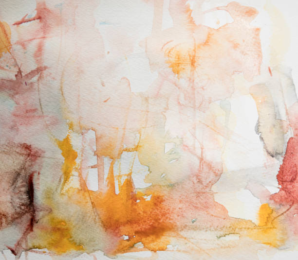 istock Abstract yellow and brown watercolor background on a white paper 1284659424