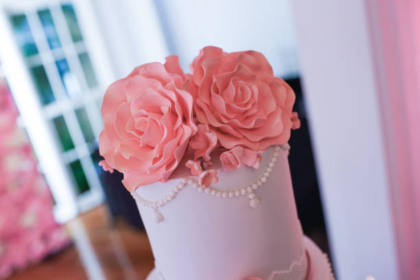 Roses on a wedding cake stock photo