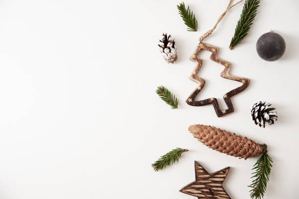 istock Christmas or New Year background with copy space. Christmas decorations on white background, top view 1284663076