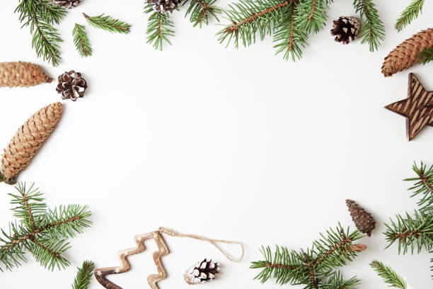 istock Christmas or New Year background with copy space. Christmas decorations on white background, top view 1284663080