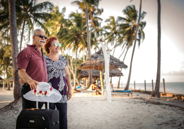 istock Senior couple enjoying their vacation at the beach 1284676448