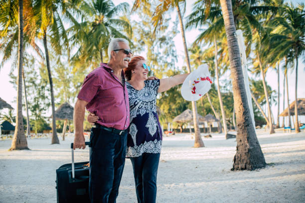 istock Senior couple enjoying their vacation at the beach 1284676640