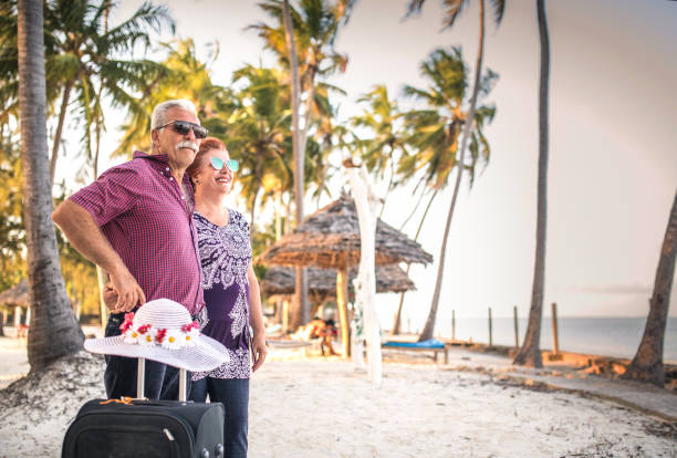 istock Senior couple enjoying their vacation at the beach 1284676838