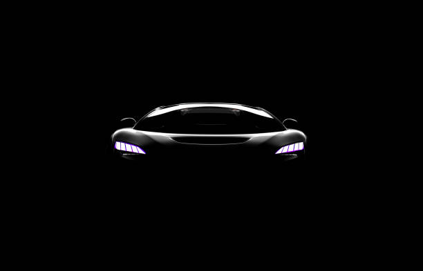 istock black sportscar silhouette on black background 1284676946